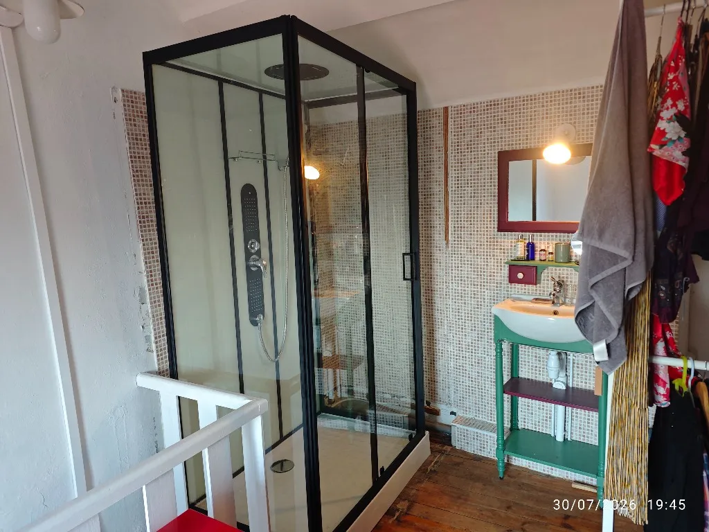 Installation d'une cabine de douche hydromassante à Alès